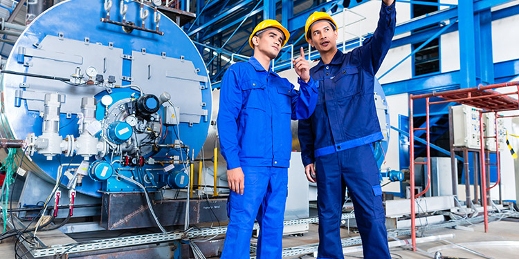 Boiler upgrades - workers with hard hats - Northmore Gordon